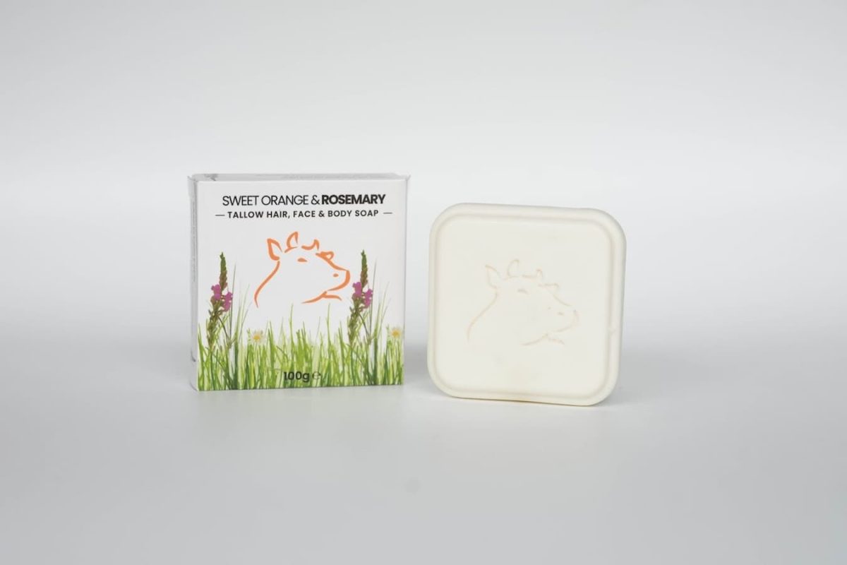 Soft orange and rosemary tallow skincare soap with natural ingredients for face and body.