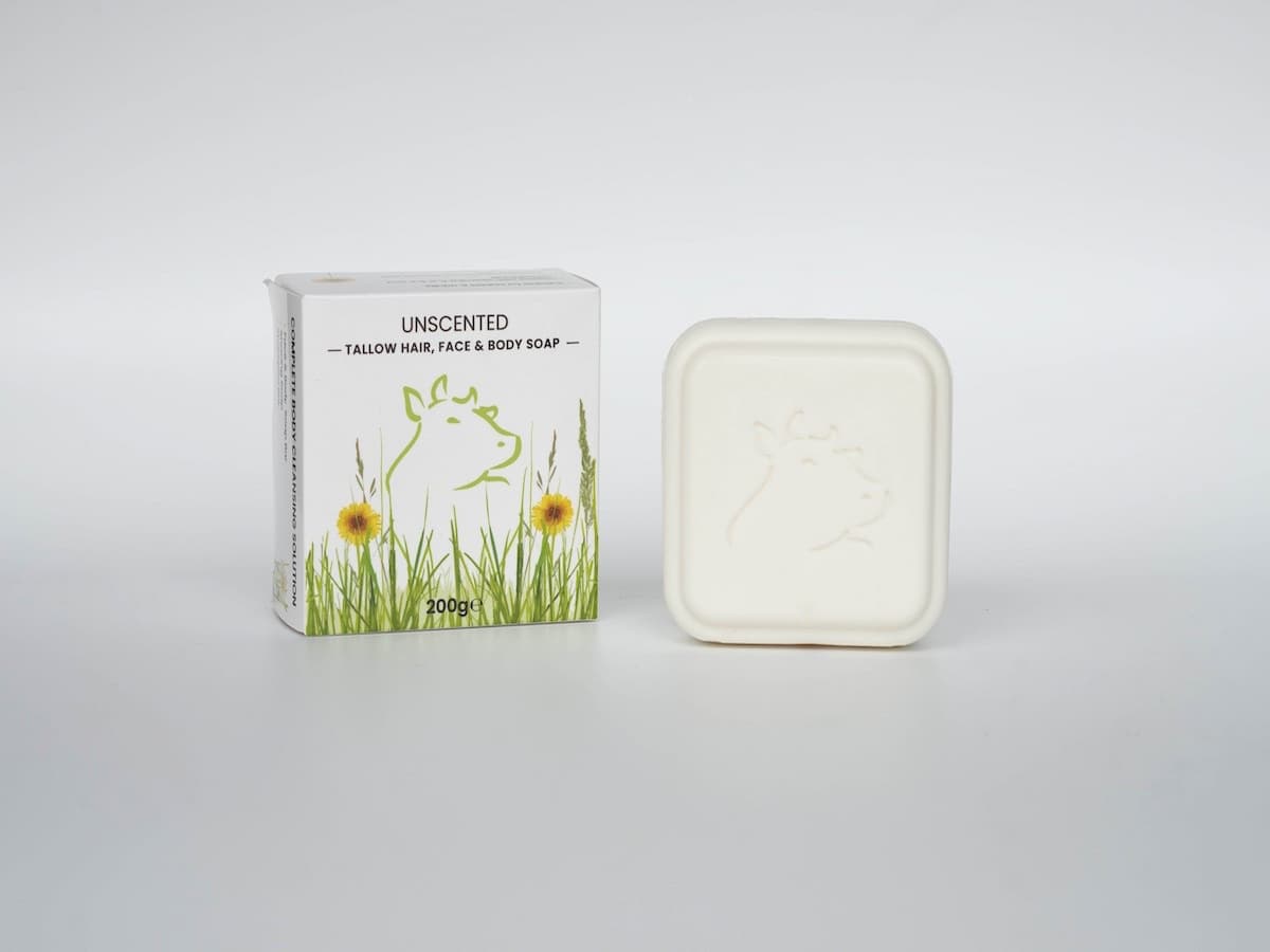 Pure tallow skincare soap in eco-friendly packaging, emphasizing organic ingredients and natural bea.