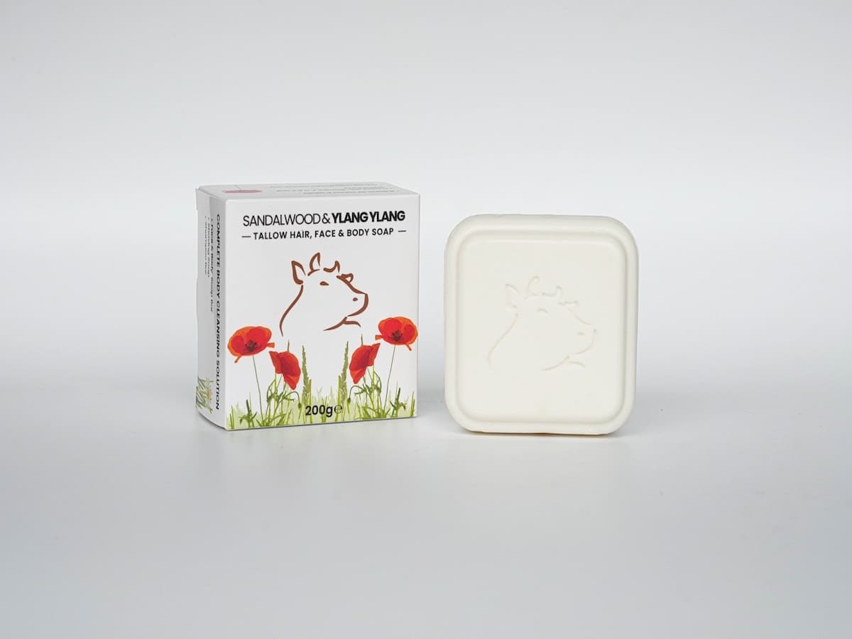 Gentle tallow skincare soap with organic sandalwood and ylang-ylang essential oils.
