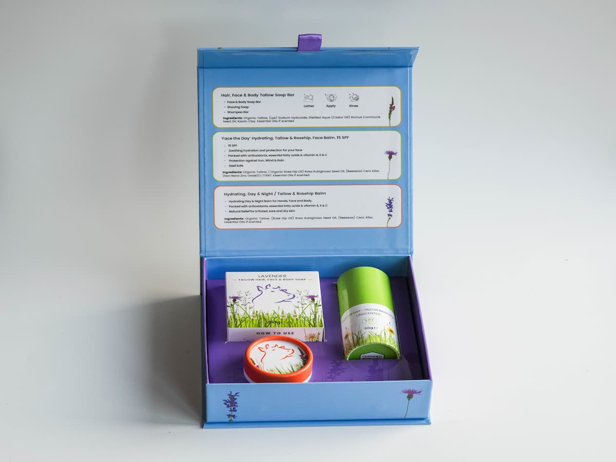 Tallow skincare set with organic ingredients in a blue box, eco-friendly and natural.