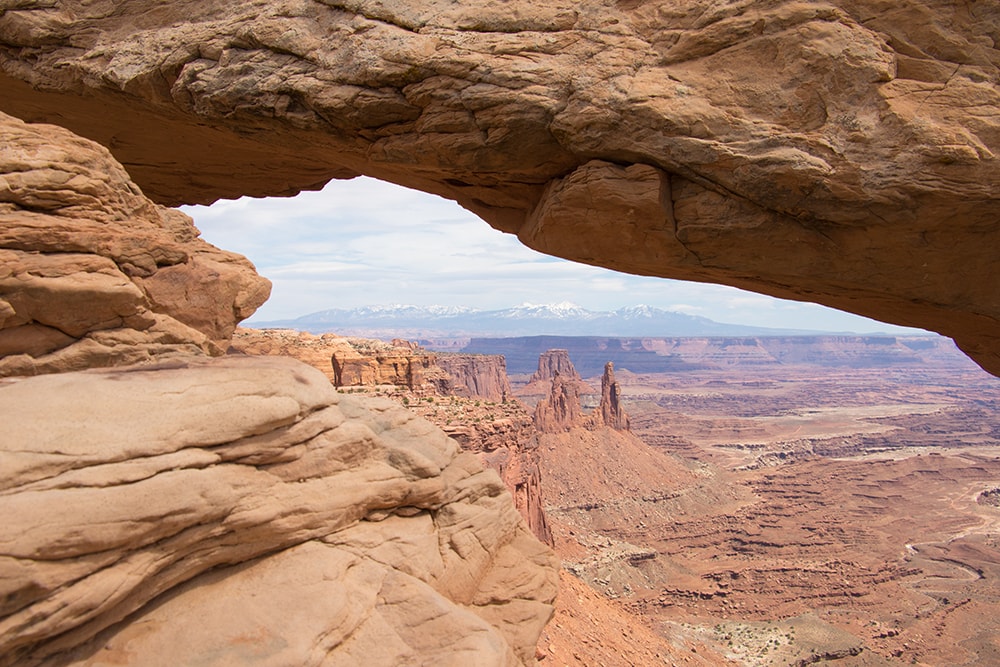 Utah National Parks Road Trip – The Perfect Itinerary A view of mesa arch at Canyonlands