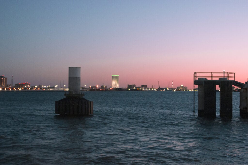 Cheap Spring Break Trips For Families In The U.S. Purple and pink hues fill the sky in this Galveston sunset.