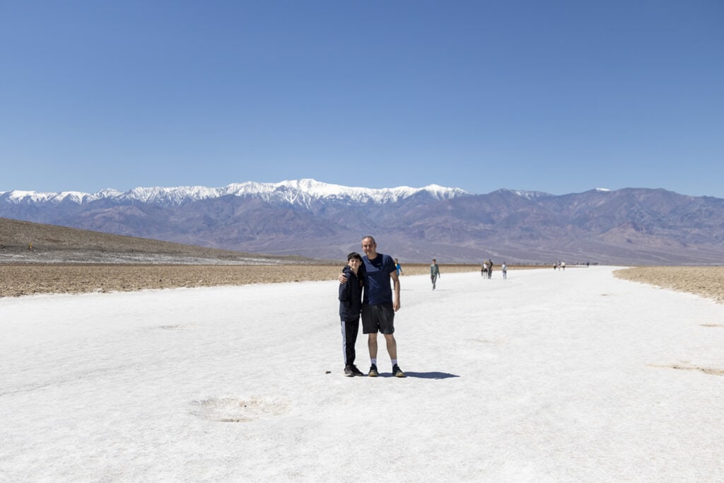 USA Destination Dupes: Alternatives to Popular Travel Spots Salt flats at Badwater Basin, the lowest point in North America. A vast, otherworldly landscape with unique polygonal patterns, mirroring the unparalleled beauty of this Death Valley destination.
