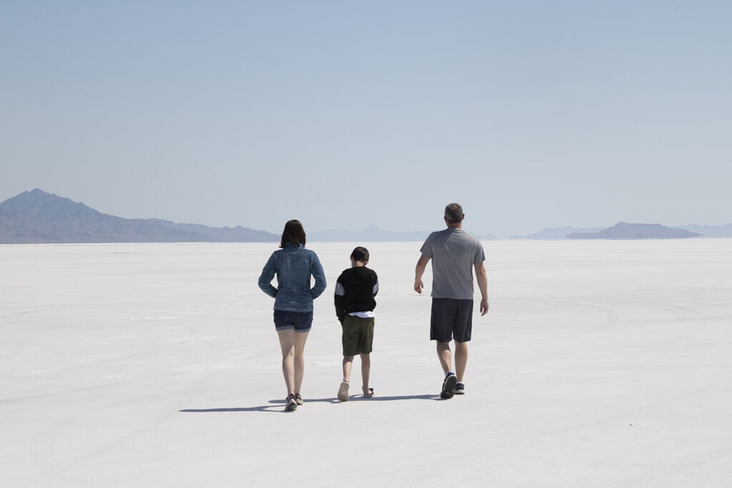 USA Destination Dupes: Alternatives to Popular Travel Spots Bonneville Salt Flats – A vast expanse of white salt crust under a clear blue sky, creating a surreal and iconic landscape known for speed records and stunning natural beauty.