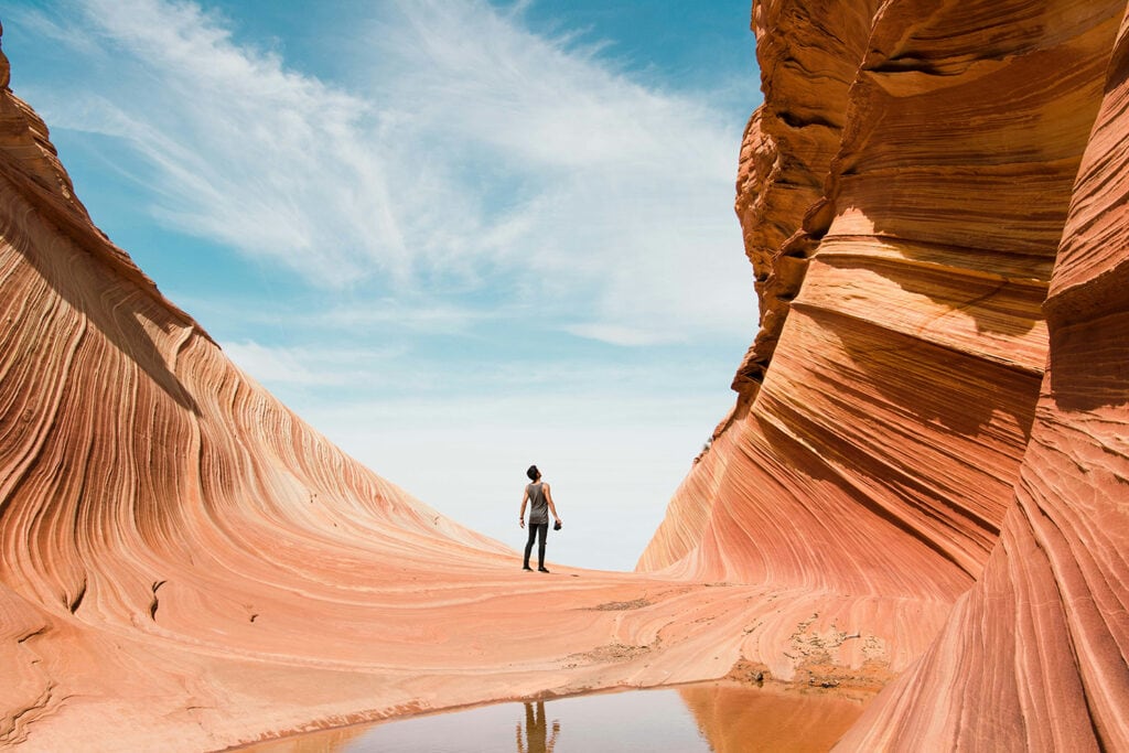 USA Destination Dupes: Alternatives to Popular Travel Spots The Wave - A mesmerizing sandstone formation in the North Coyote Buttes of Arizona, showcasing swirling patterns and vibrant hues. A rare and sought-after destination, illustrating the unique beauty of the American Southwest