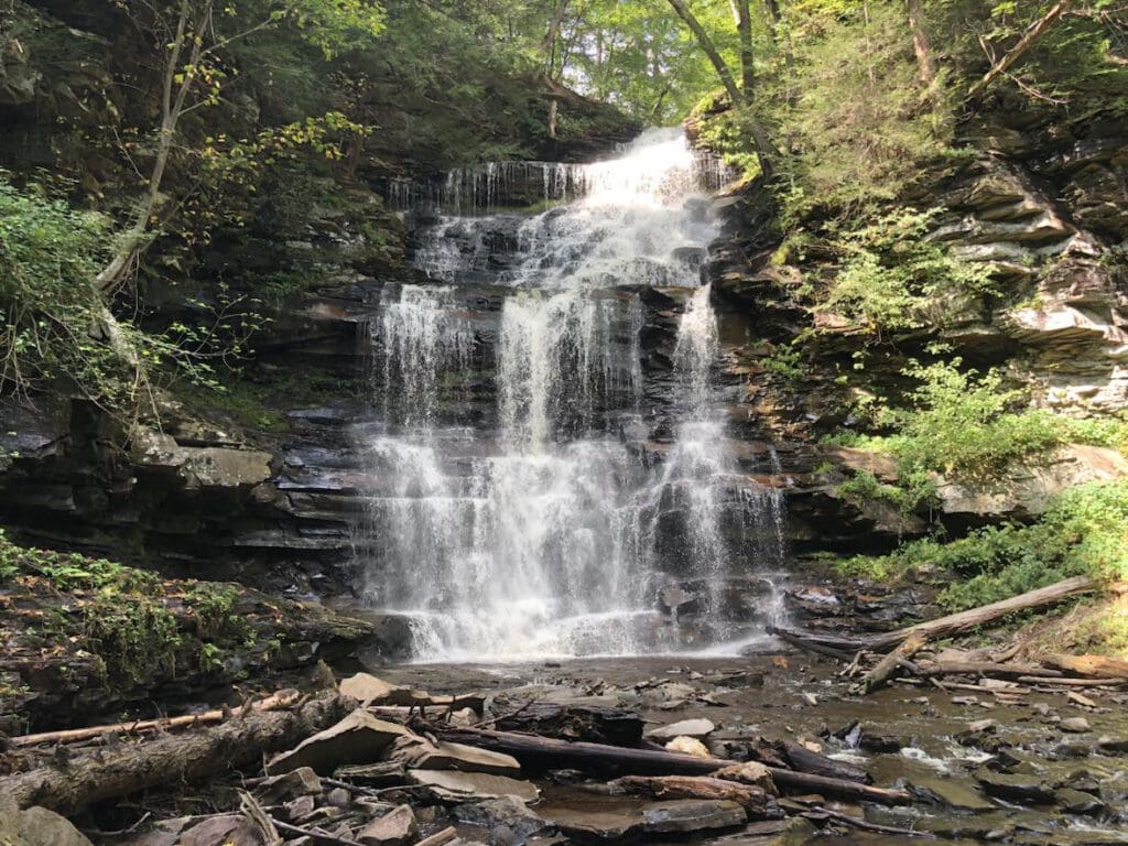 Top 10 Best Waterfalls for Kids in the USA Ricketts Glen Falls Trail Loop. One of the best hikes to see waterfalls with kids