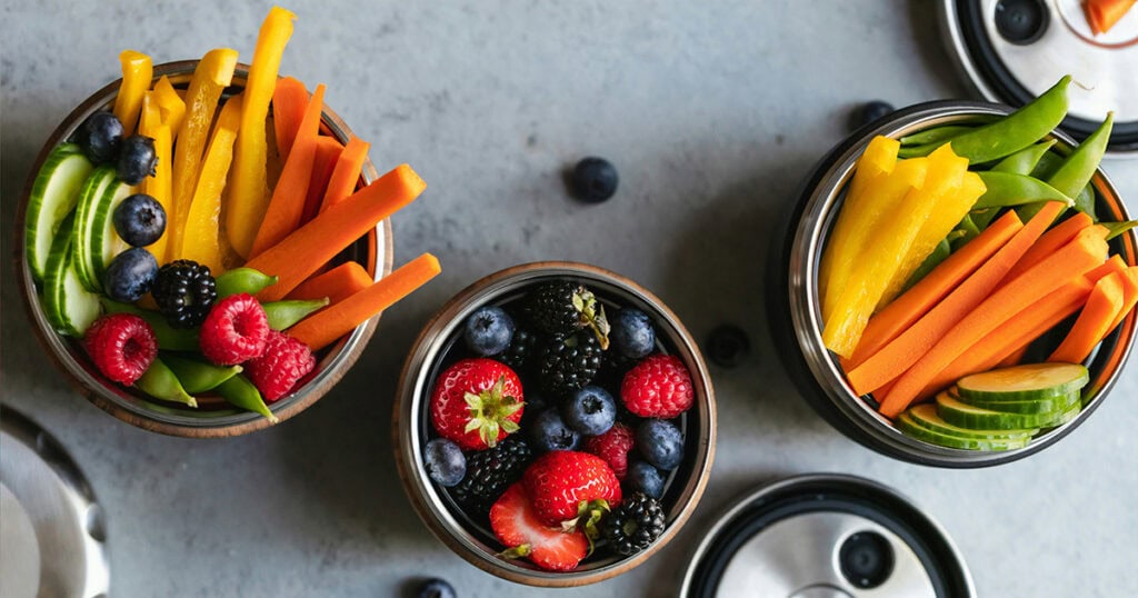 The Best Road Trip Snacks For Families (Healthy,Easy, & Mess-Free) road trip snacks - cut up vegetables in portable containers.