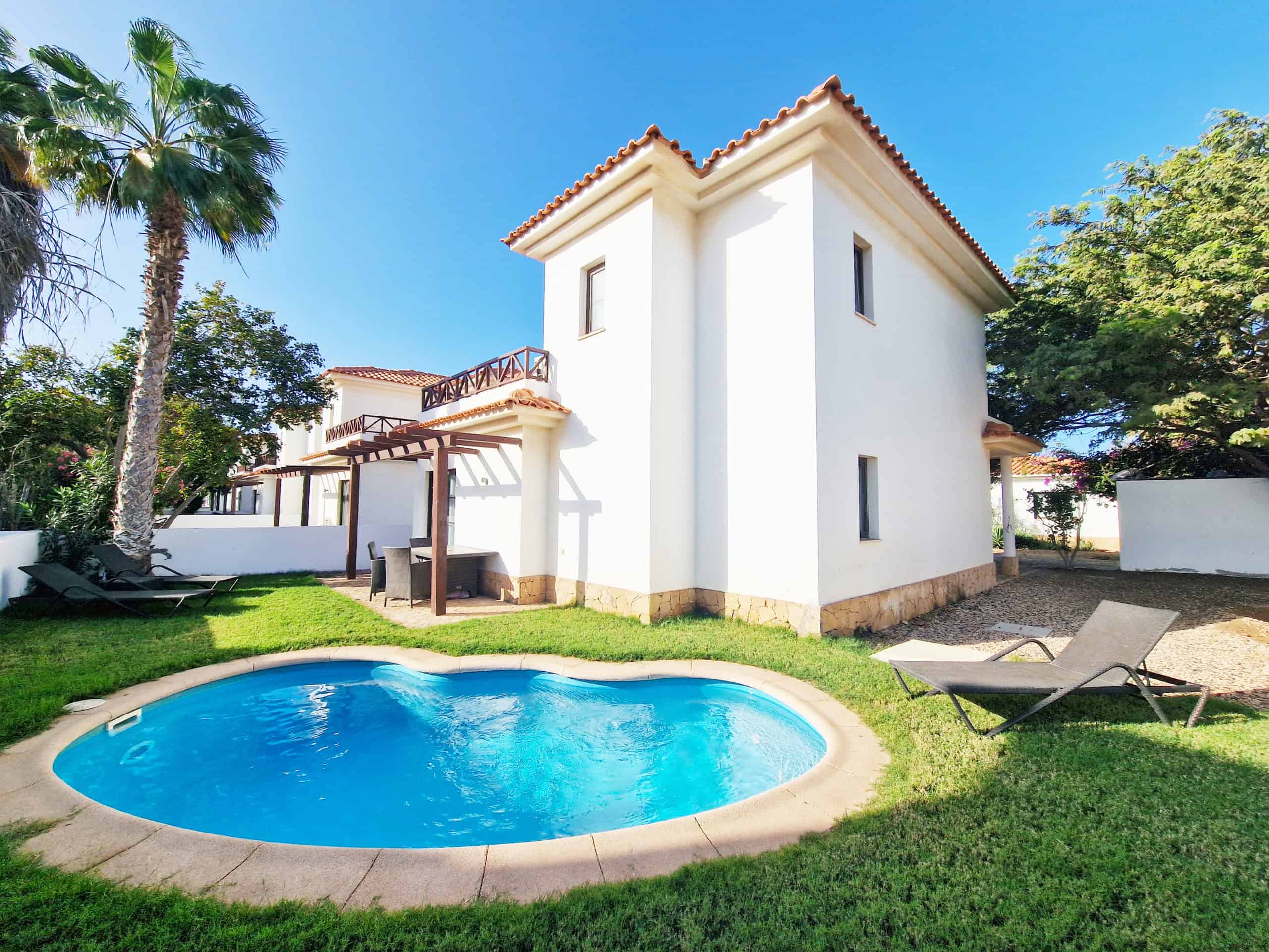 Rear garden with pool. Detached Corner Plot 3 Bedroom Villa: Melia Tortuga, Sal, Cabo Verde. casa Verde Homes LDA