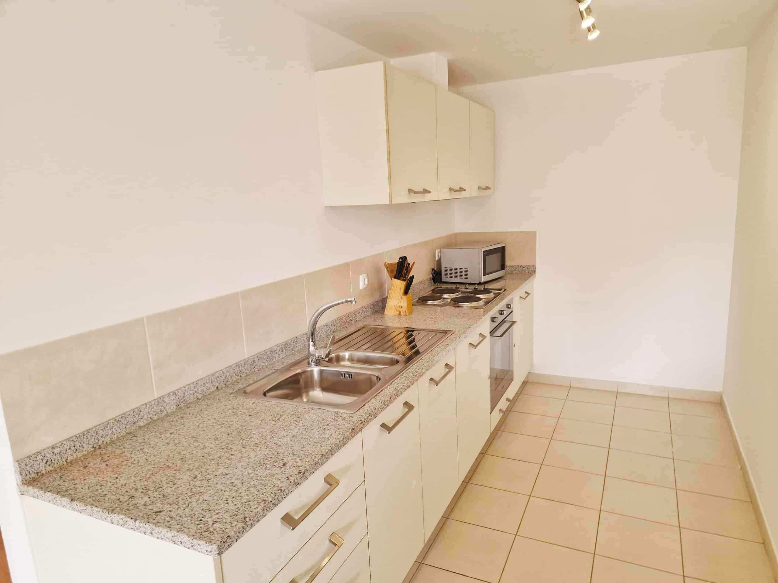 Kitchen: Secluded 2 Bed Apartment for Sale