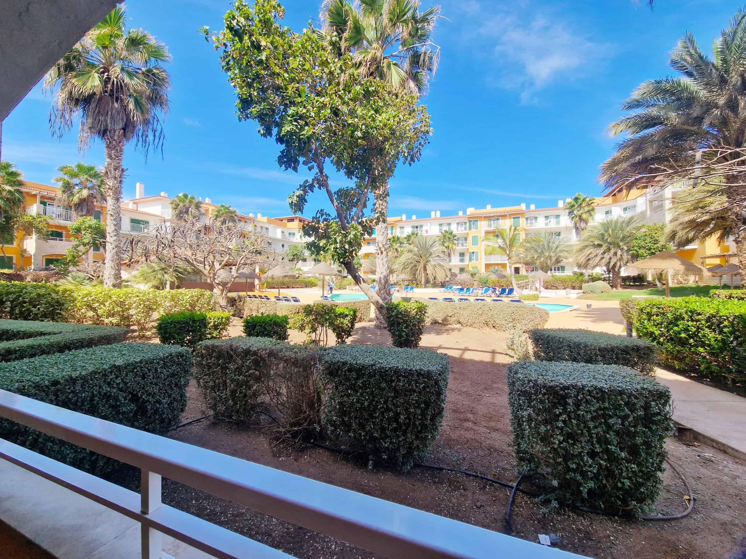Balcony View: Poolside Vila Verde 1-Bed Apartment for Sale