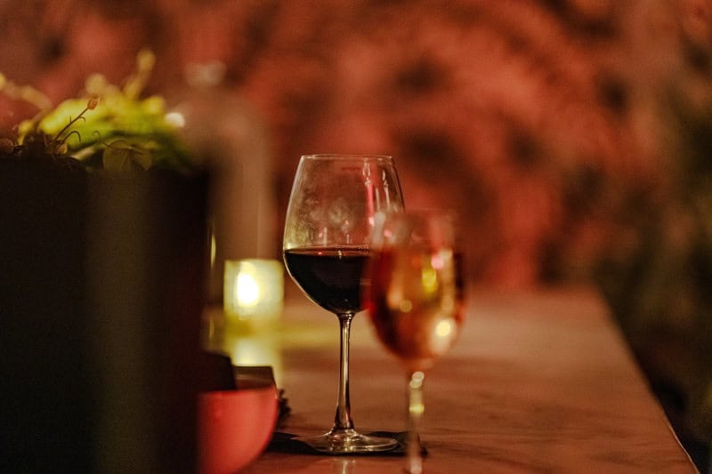 Two glasses of wine on a table