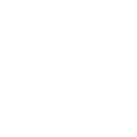 A Small Orange Pumpkin On A Flat Surface Against A White Background.