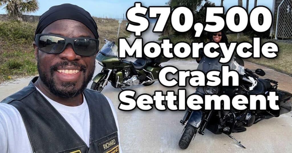  Smiling Black man wearing sunglasses and a black leather motorcycle vest with 'Richard' embroidered on it, standing next to two motorcycles. Large text overlay reads '$70,500 Motorcycle Crash Settlement.
