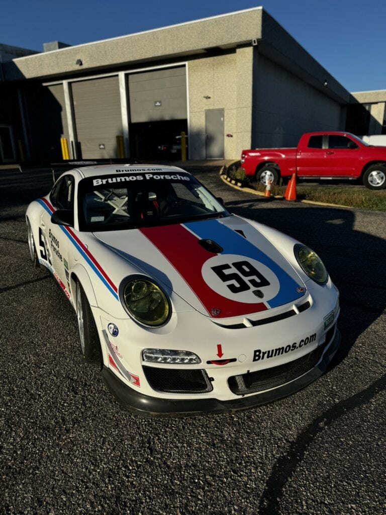 Kellymoss Porsche 997 Cup race car with Brumos Porsche branding.