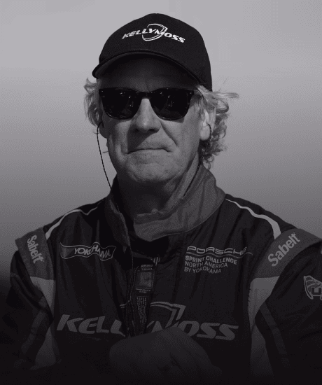 Kellymoss racing driver in racing suit and cap at GT World Challenge America.