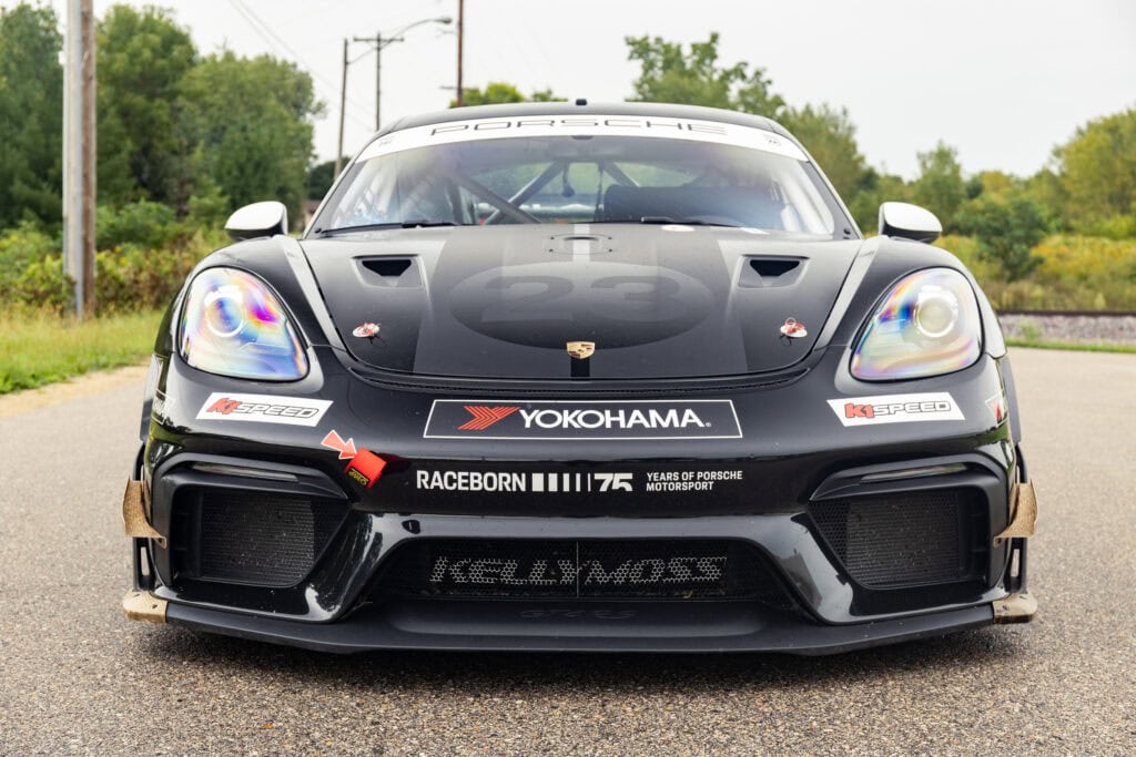 Black 2025 GT4 Clubsport RS race car with Kellymoss branding.