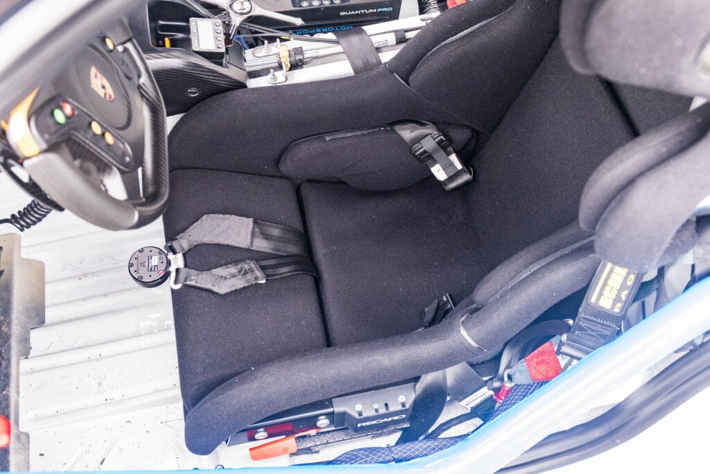 Racing car interior with racing seat and safety harness for Kellymoss 2025 GT4 Clubsport RS.