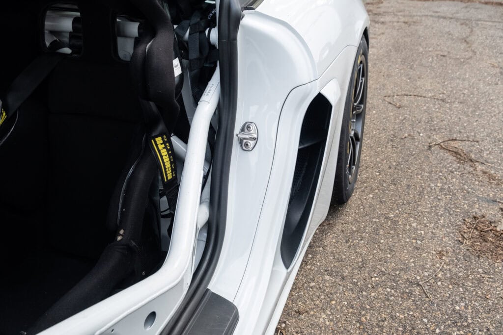 Close-up of the side air intake and door of a Kellymoss 2023 GT4 Clubsport RS.