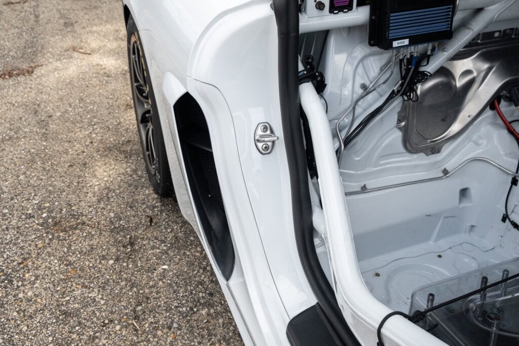 Close-up of the interior of a Kellymoss 2023 GT4 Clubsport RS race car.
