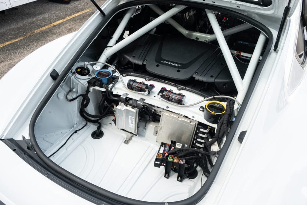 Close-up of the engine bay of a Kellymoss 2023 GT4 Clubsport RS race car.