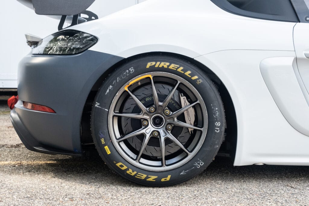 Close-up of racing wheel with Pirelli tires on a 2023 GT4 Clubsport RS.