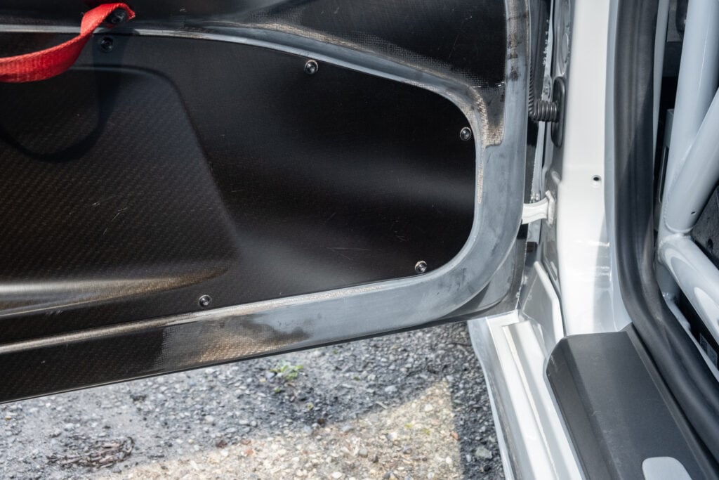Close-up of car interior door panel at Kellymoss 2023 GT4 Clubsport RS.