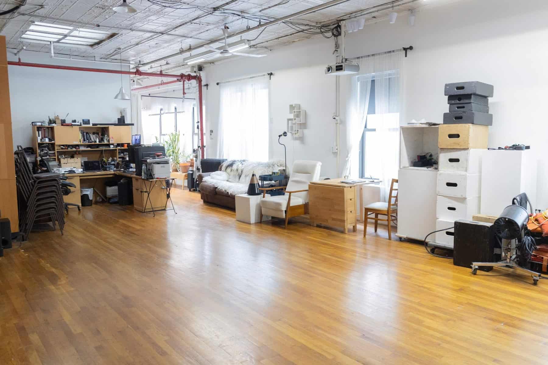 Bright Manhattan photo studio rental space with open shooting floor and client seating