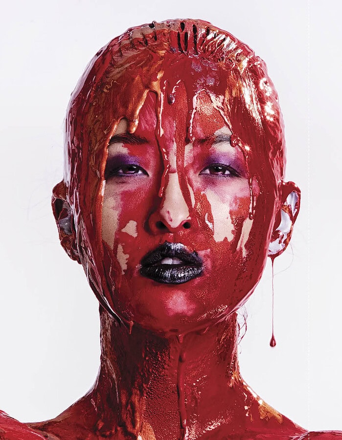 Brittany with red paint on her face article page