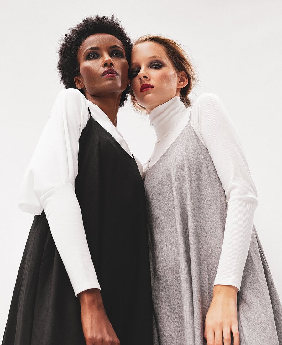Fashion models in stylish monochrome outfits posing together. photographer NYC