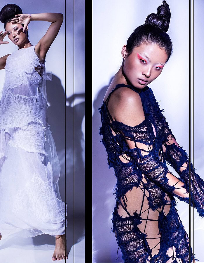 Model wearing a layered white knit dress with a dramatic shadow in a cool-toned studio.