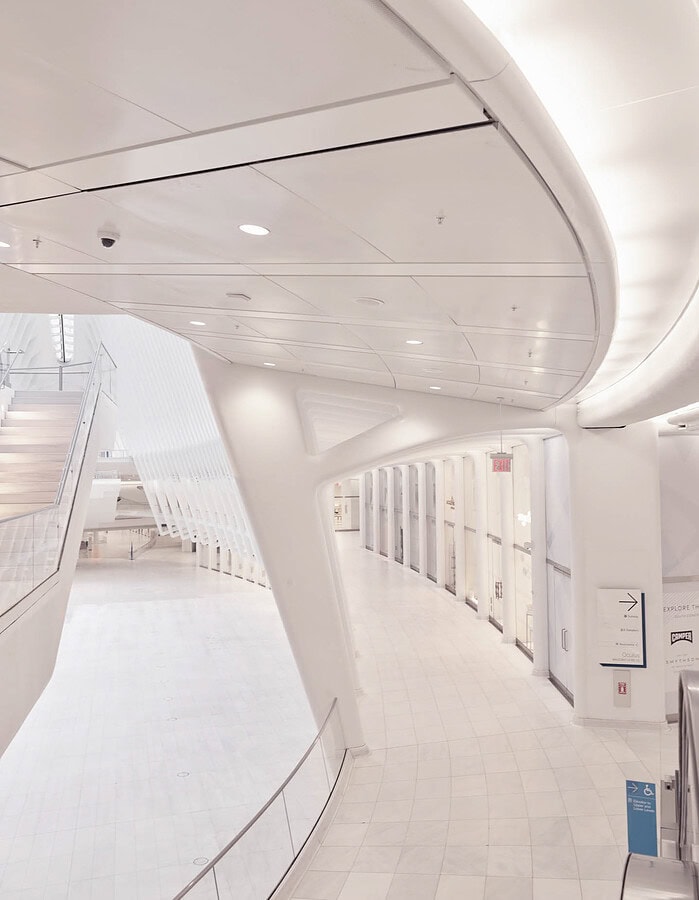 White curving interior architecture inside the World Trade Center Oculus photographed during COVID.