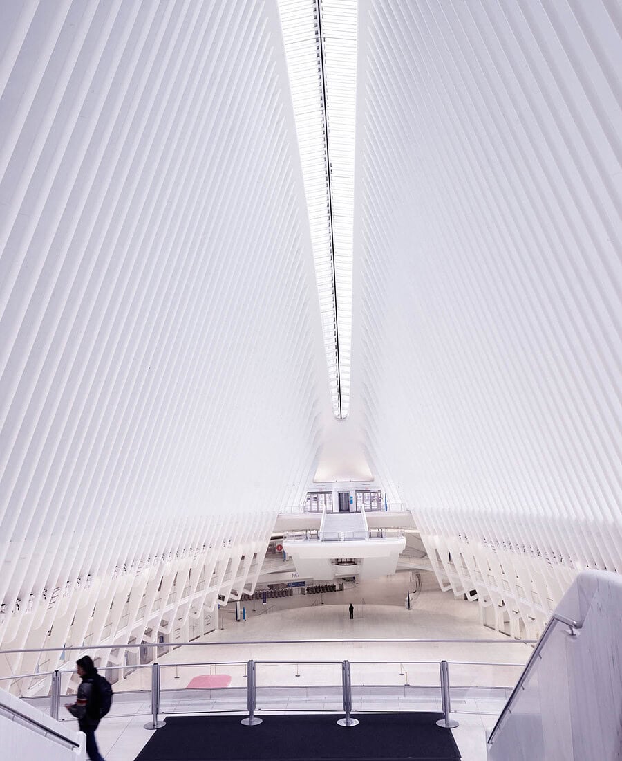 Empty World Trade Center Oculus interior with white ribbed architecture during COVID in New York City.