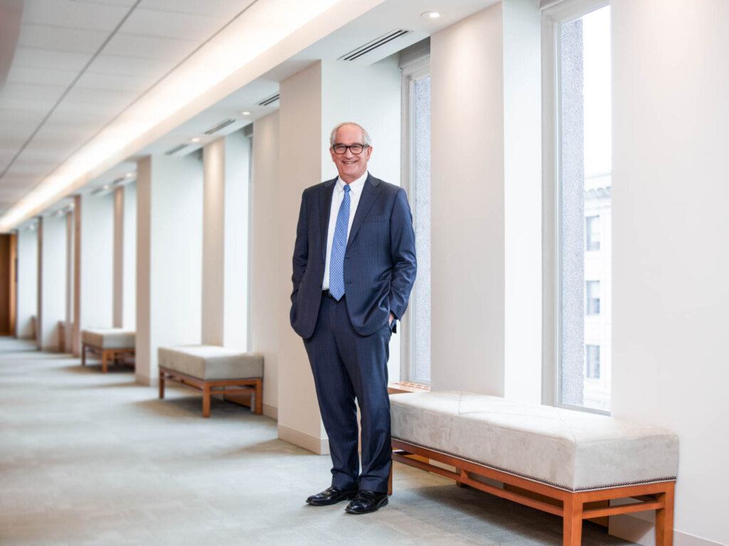 Oppenheimer executive environmental portrait in a modern New York office
