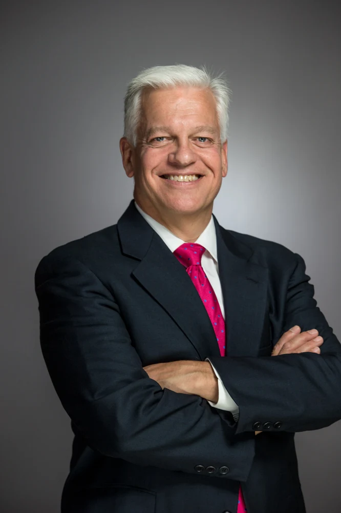 Corporate management portrait photographed with controlled studio lighting