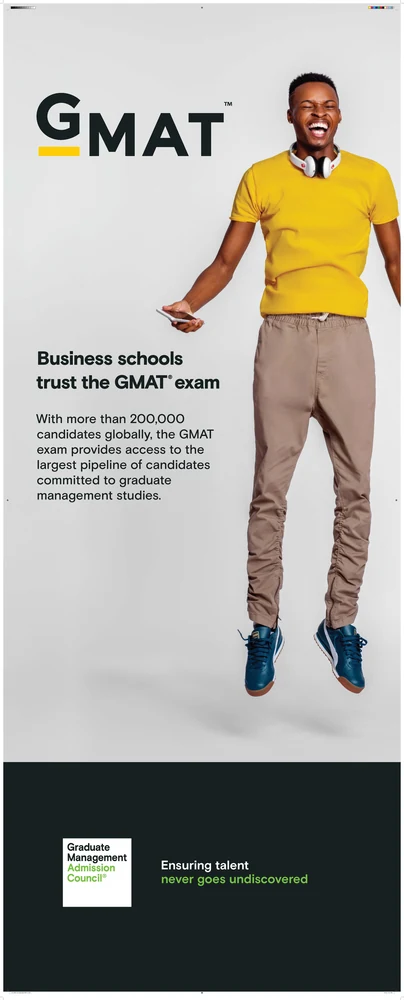GMAT vertical banner featuring a jumping male candidate