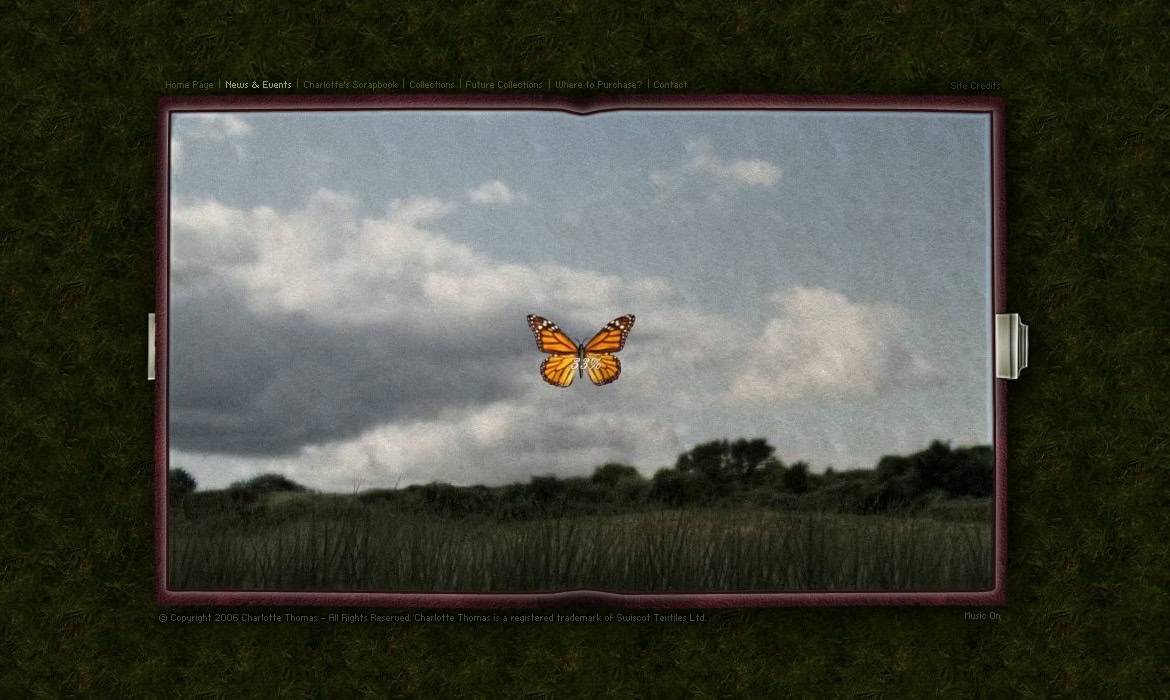 A butterfly flying over a grassy field with a cloudy sky in the background.