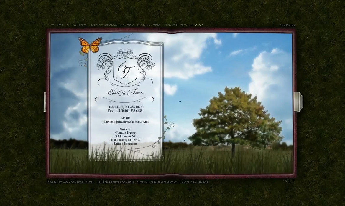 A large outdoor digital screen displaying a business card design with a tree and blue sky background.