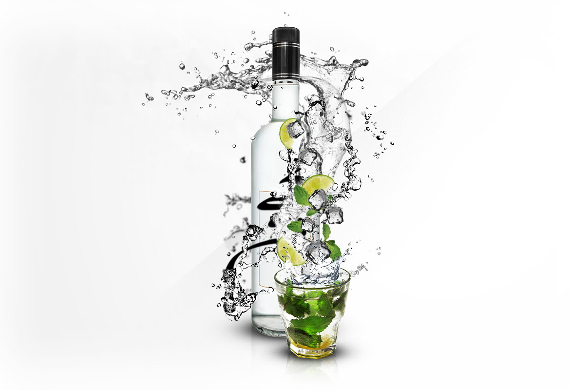 Bottle of clear spirit with lime slices and mint leaves, surrounded by splashing water.