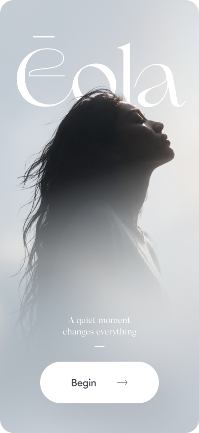 Silhouette of a woman with flowing hair against a light background, with the word 'Éla' and a 'Begin' button visible.