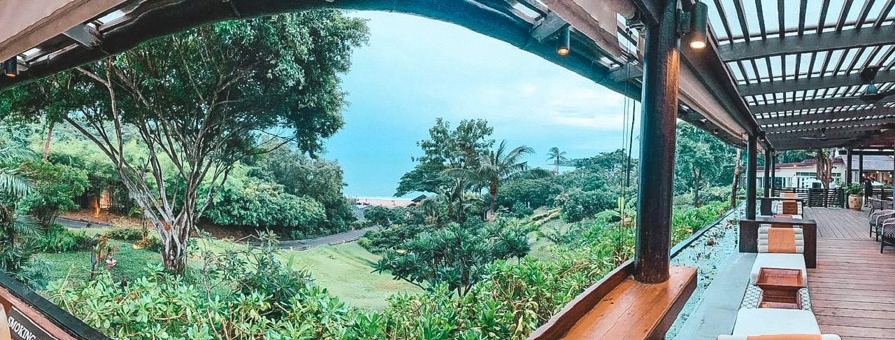 Luxury outdoor lounge with lush tropical views in Koh Samui.