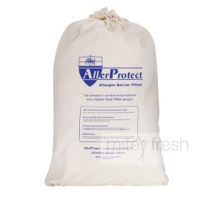 AllerProtect Pillow Protector zipped over pillow on bed