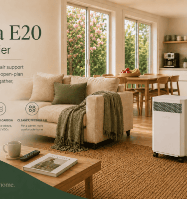 Inova E20 air purifier positioned within a calm open-plan living room and family entertainment space