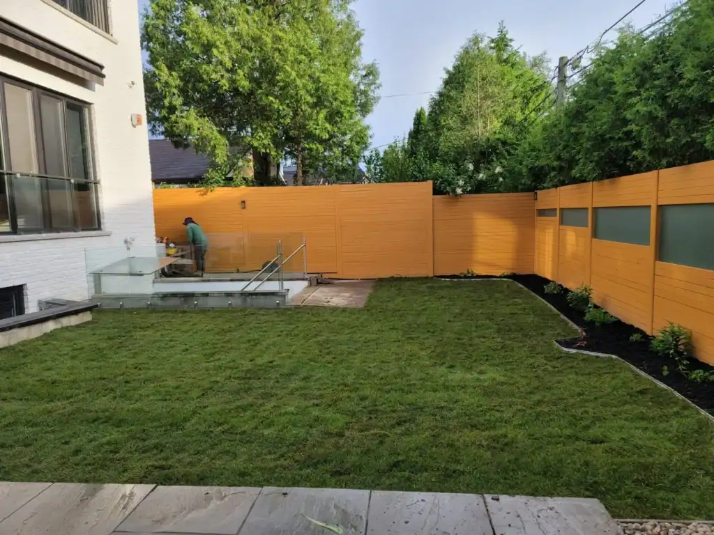 Lawn care expert consulting with homeowner on lawn maintenance strategies