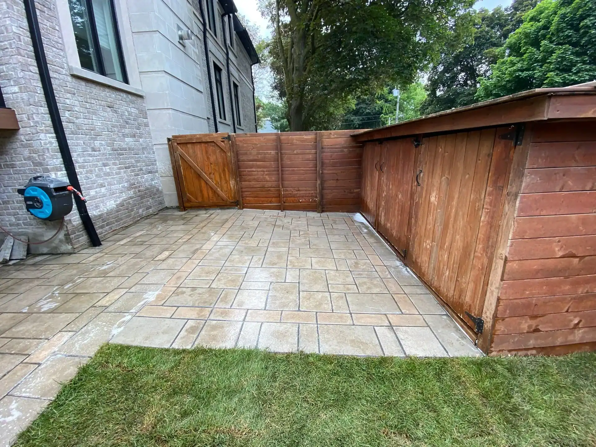 Homeowner installing interlocking pavers illustrating DIY installation techniques