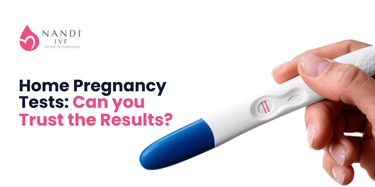 Pregnancy test kit showing positive result with two lines.