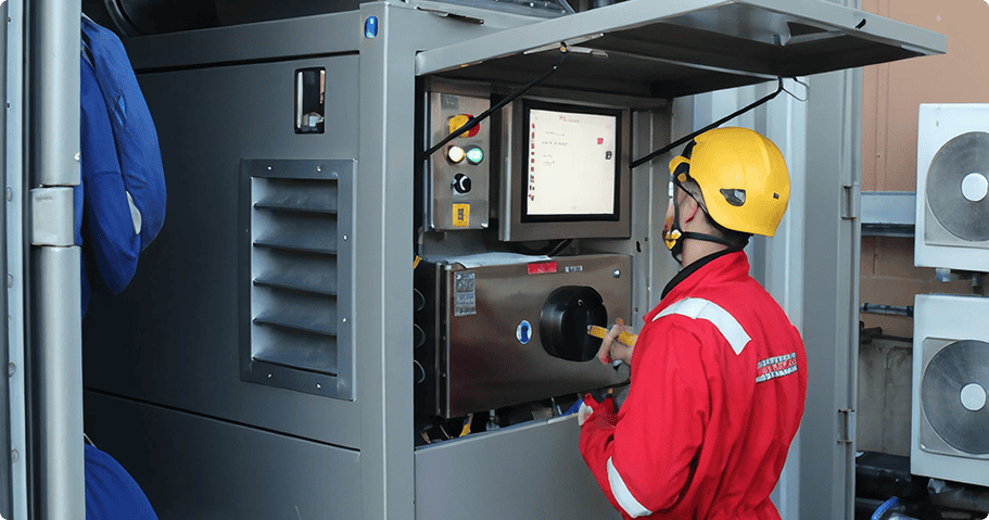 Industrial control room operator monitoring fire protection systems