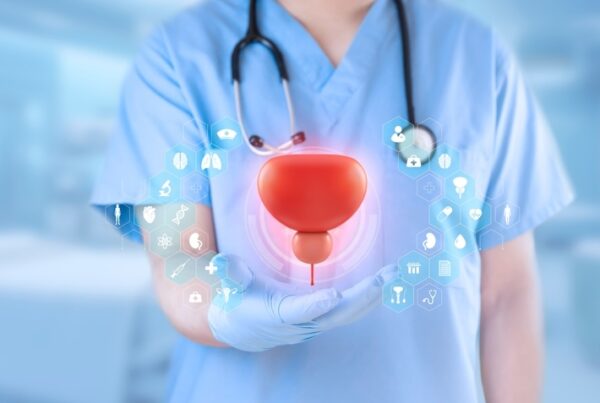 Photo of physician with superimposed diagram of bladder and prostate to illustrate the need for prostate monitoring.