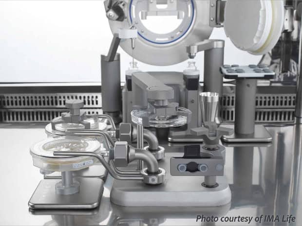 A viable settle plate in an open configuration inside an IMA isolator for environmental monitoring.