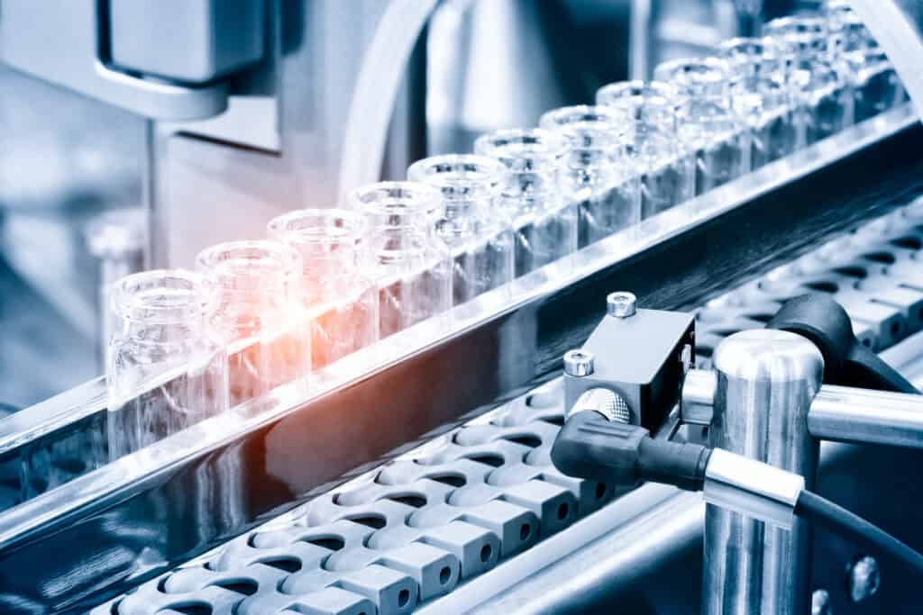 aseptic pharmaceutical manufacturing vials on fill line