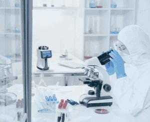Microbial lab for peciation analysis under a microscope with Minicapt mobile in background